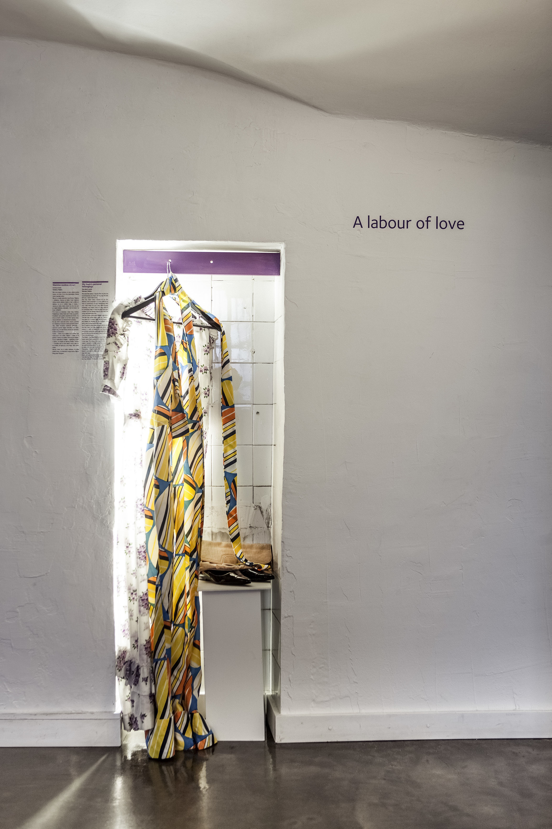 A rusted bicycle against a wall at the Museum of Broken Relationships